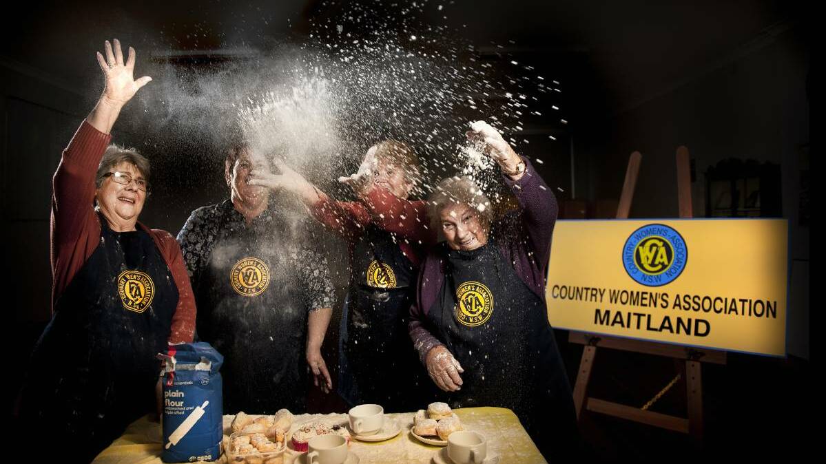 FLOUR POWER: Margaret Harvey, Cynthia Abbott, Barbara Heckman and June Gardner have a flour fight in the CWA Hall. Pictures: Perry Duffin.