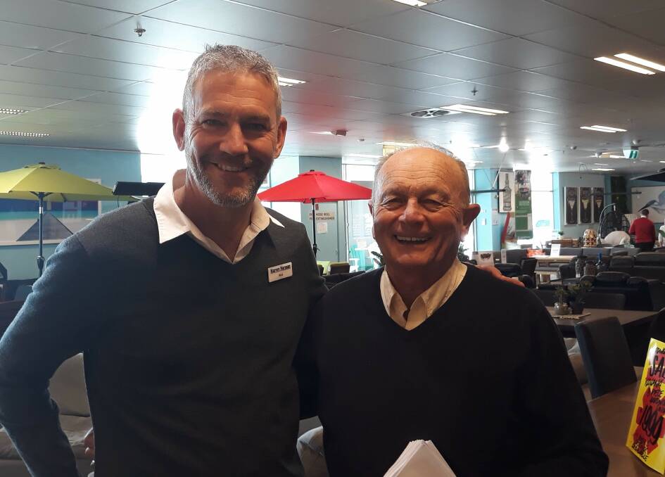 Nick Swanson with Gerry Harvey in the Harvey Norman store. Picture supplied