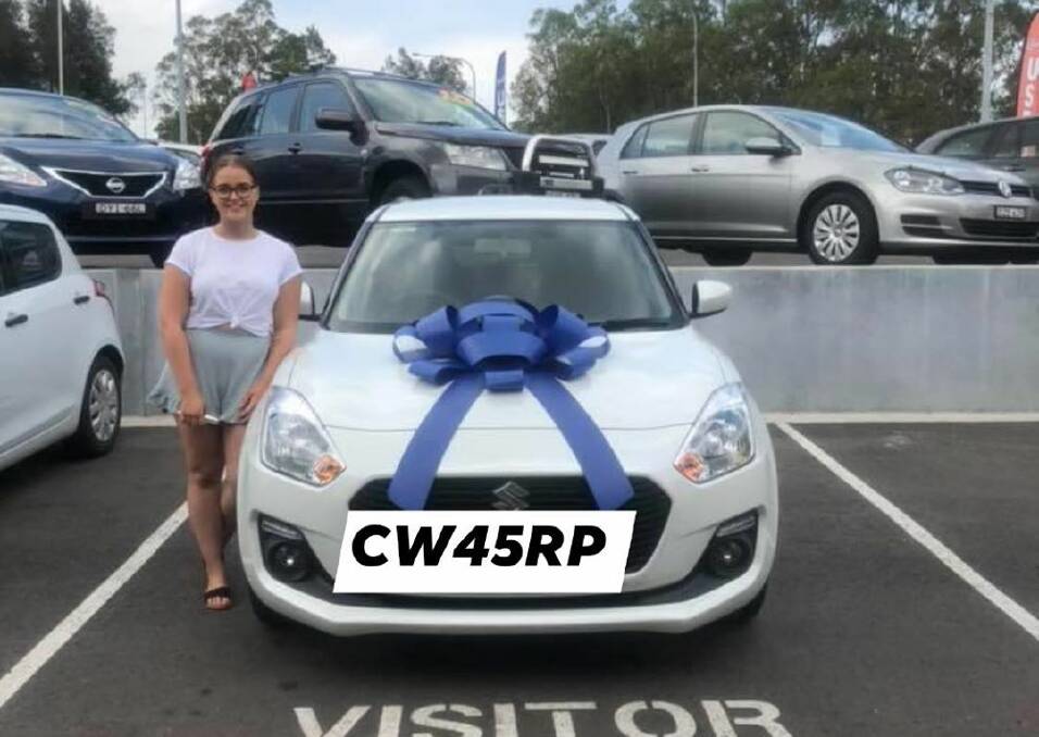 SEARCH: Lauren Ling with the 2018 Suzuki Swift that was stolen from her home in East Maitland on June 12. Picture: supplied
