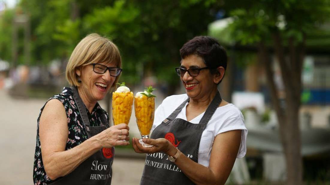 CHEERS: Slow Food Hunter Valley's Helen Hughes and Amorelle Dempster in 2017 after the first mango rescue in The Levee.