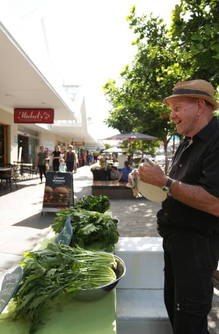 MARKET: Farmer Mark Brown, of Purple Pear Farm, with some of his produce at the Slow Food Earth Market Maitland. Picture: Simone De Peak
