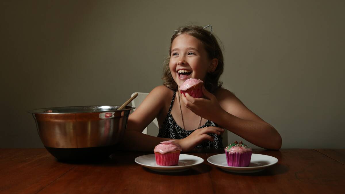COOKING UP A CUPCAKE: Ruby Holdsworth with some of the cupcakes she made leading up to the Maitland Show. Pictures: Simone De Peak