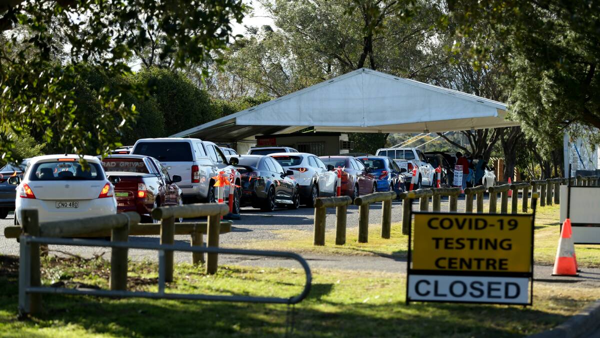 TEST: The queue at the East Maitland testing clinic on Wednesday afternoon.Picture:Jonathan Carroll