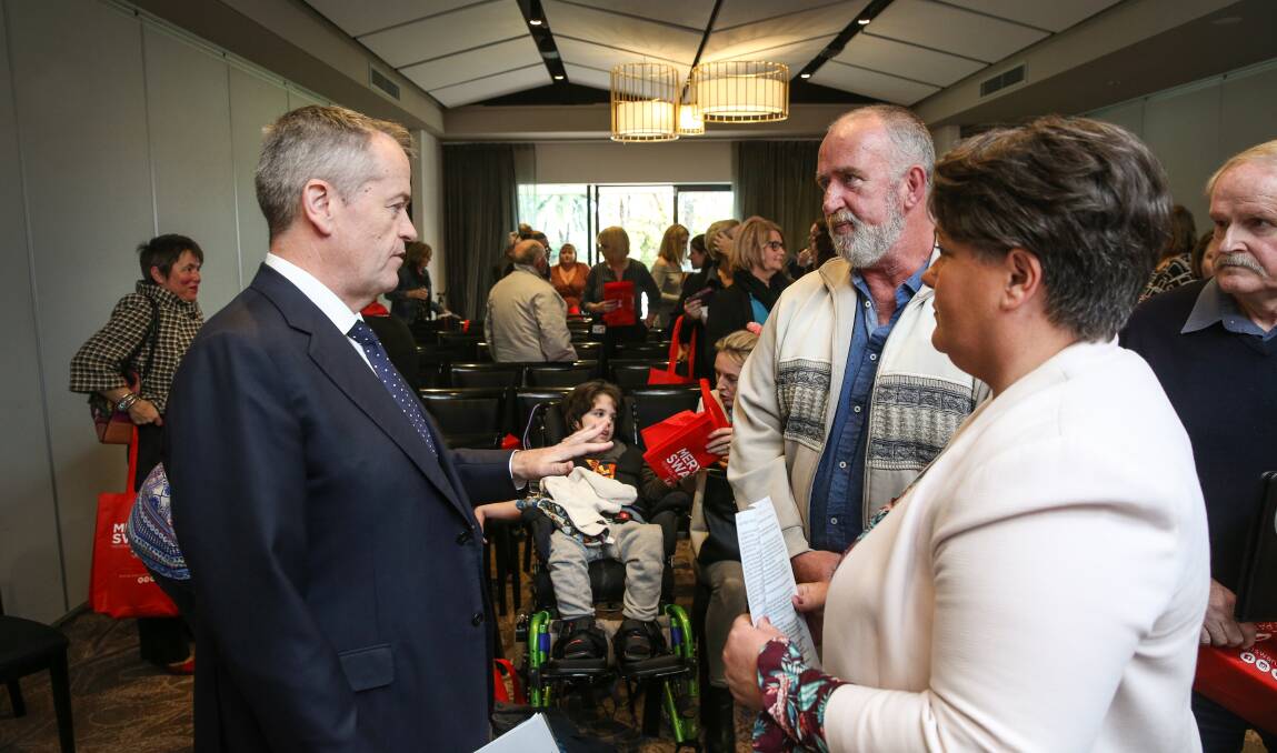 FORUM: Shadow Minister for the National Disability Insurance Scheme (NDIS) Bill Shorten speaks with Chris Walker and Paterson MP Meryl Swanson. Picture: Marina Neil