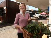 VEGGIE FOCUS: Dietician Nicole Barber at the Slow Food Earth Market Maitland in The Levee with a basket of herbs. Picture: Simone De Peak