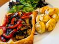 Mushroom and capsicum galette with roast potatoes and green salad made from food scraps. 