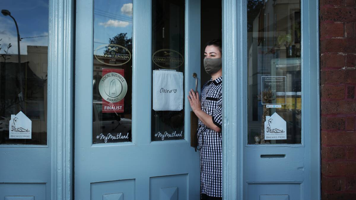 HELPING OTHERS: The Cunning Cullinarian owner Alina Mackee stands at the door of the premises. Picture: Simone De Peak