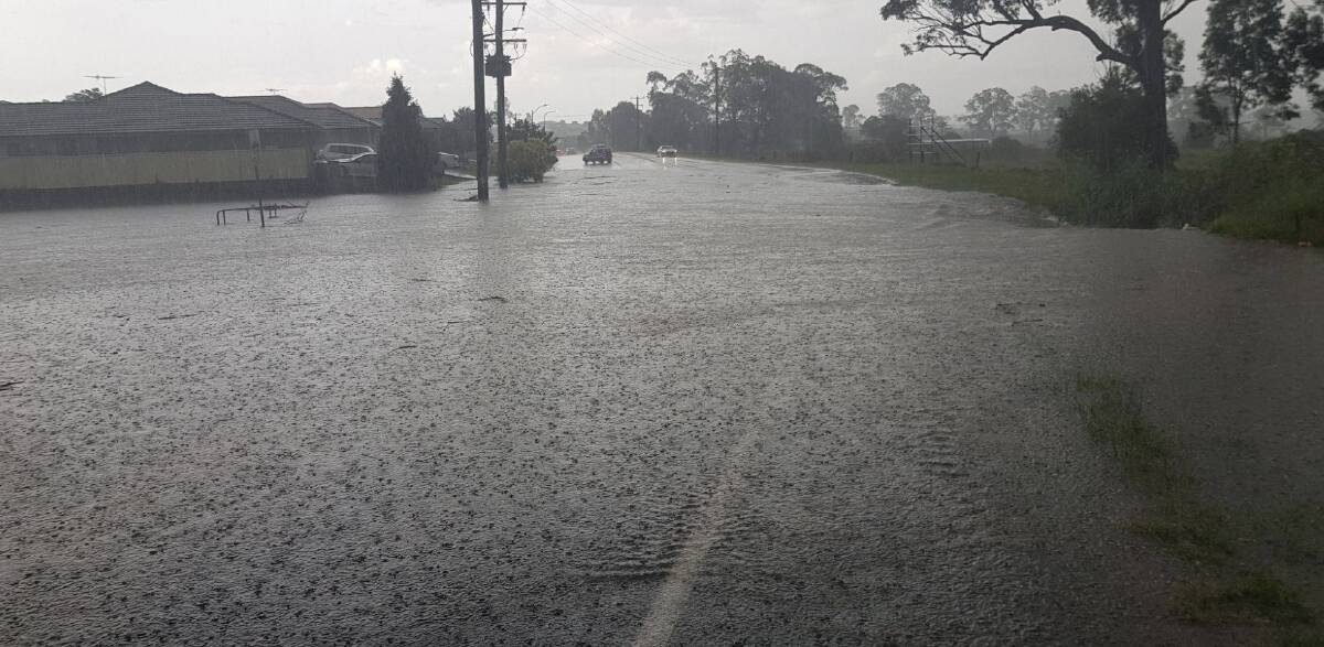 FLOODED: Aberglasslyn Road at Rutherford on Saturday after the storm. Picture: Maitland SES Unit