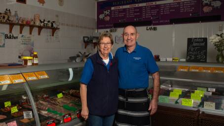 TIME TO RETIRE: Gail and Wayne Reid at their Reid's Telarah Butchery shop. Picture: Marina Neil 