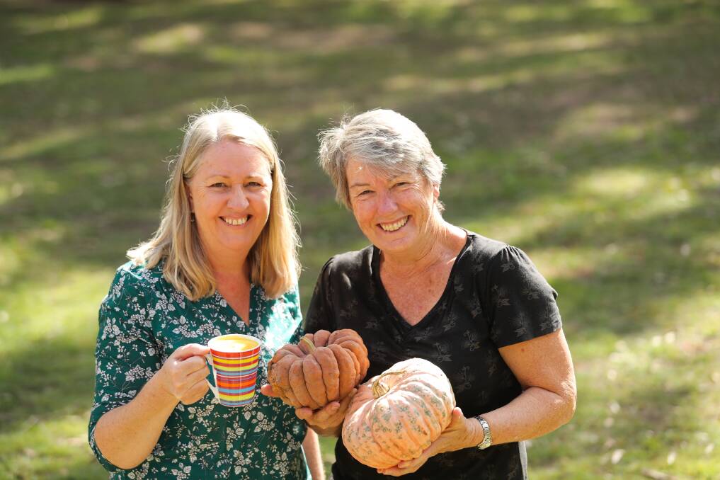 HELP A FARMER: Slow Food Hunter Valley's Jenny Mulcahy, left, with pumkin soup, and Anne Kelly, right, with pumpkins. Picture: Jonathan Carroll.
