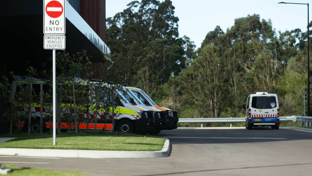 WAITING: Ambulances parked outside the new Maitland Hospital at Metford on Wednesday. Picture: Jonathan Carroll