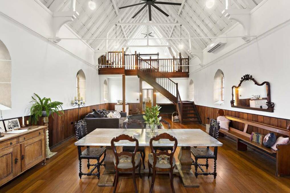 The living area in the former church, which is now an elaborate two-bedroom home. Picture: supplied 