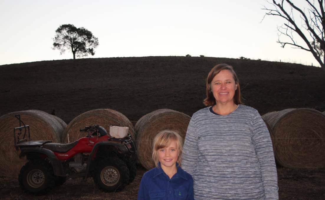 TIME FOR MORE HELP: Farmer and founder of One Day Closer to Rain Facebook page Cassandra McLaren with her daughter Emma at their drought-stricken Merriwa property. 