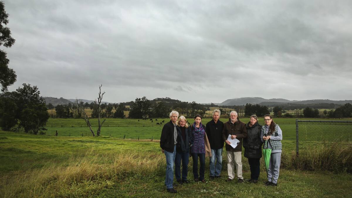 CONCERNED: Residents Paul and Gail Wright, Linda McLean, Peter Leeson, Terence Pitkin, Rhonda Warlock and Kate Wright stand in front of the view that will be transformed if the plan goes ahead. Picture: Marina Neil