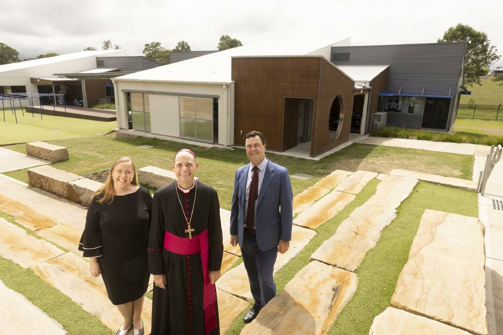 Maitland MP Jenny Aitchison, Catholic Diocese of Maitland-Newcastle Bishop Michael Kennedy and Catholic Diocese of Maitland-Newcastle CEO Sean Scanlon with the new stage 3 building at St Patricks Primary School in Lochinvar.