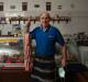 IN DEMAND: Wayne Reid, of Reid's Telarah Butchery, with some of his beef sausages. Picture: Marina Neil