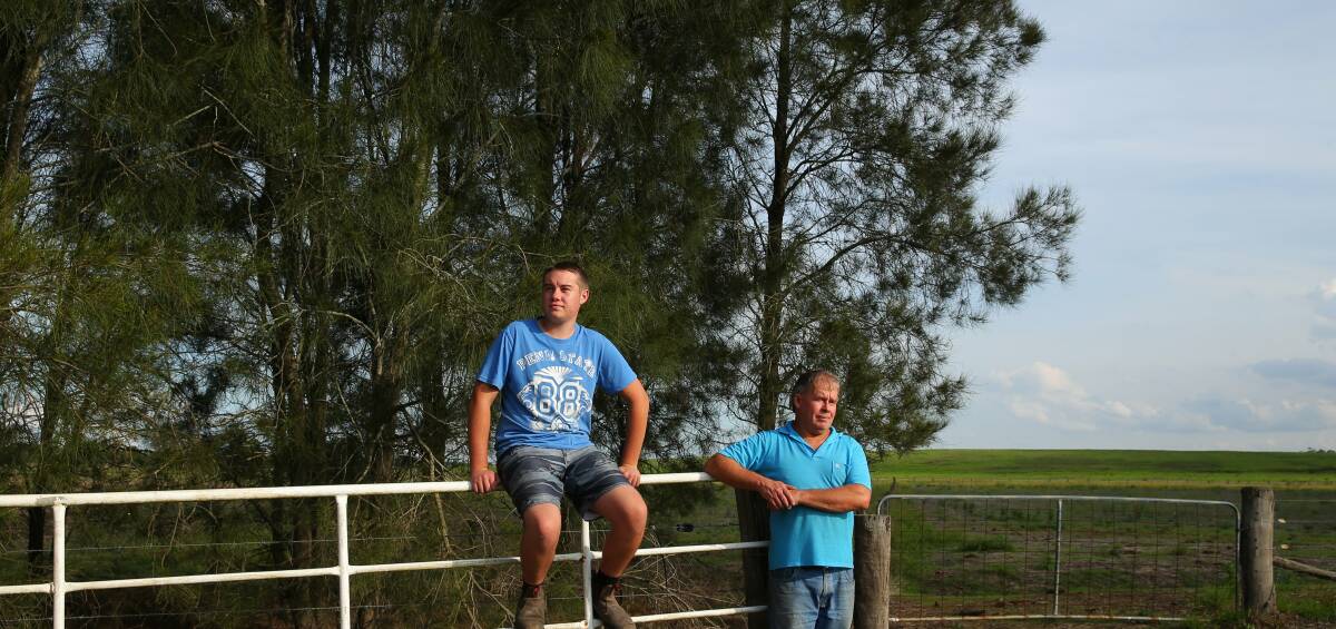 SURVIVORS: Nelsons Plains farmer Peter Manuel and his son Michael, who saved him from raging flood water during the 2015 April super storm. Picture: MAX MASON-HUBERS