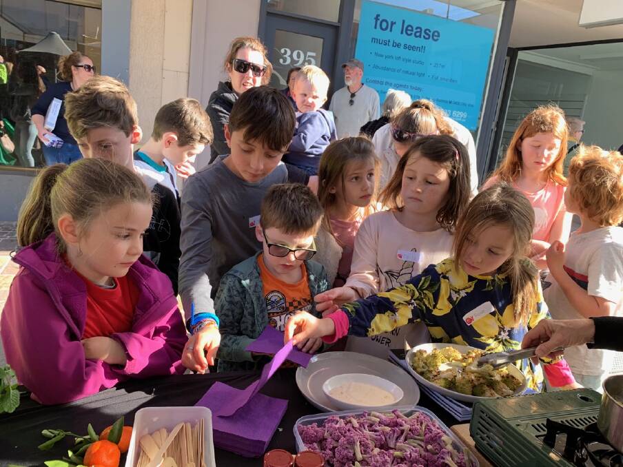 FUN WITH FOOD: Twenty children joined a tour of the Slow Food Earth Market Maitland and tasted a wide range of vegetables. 