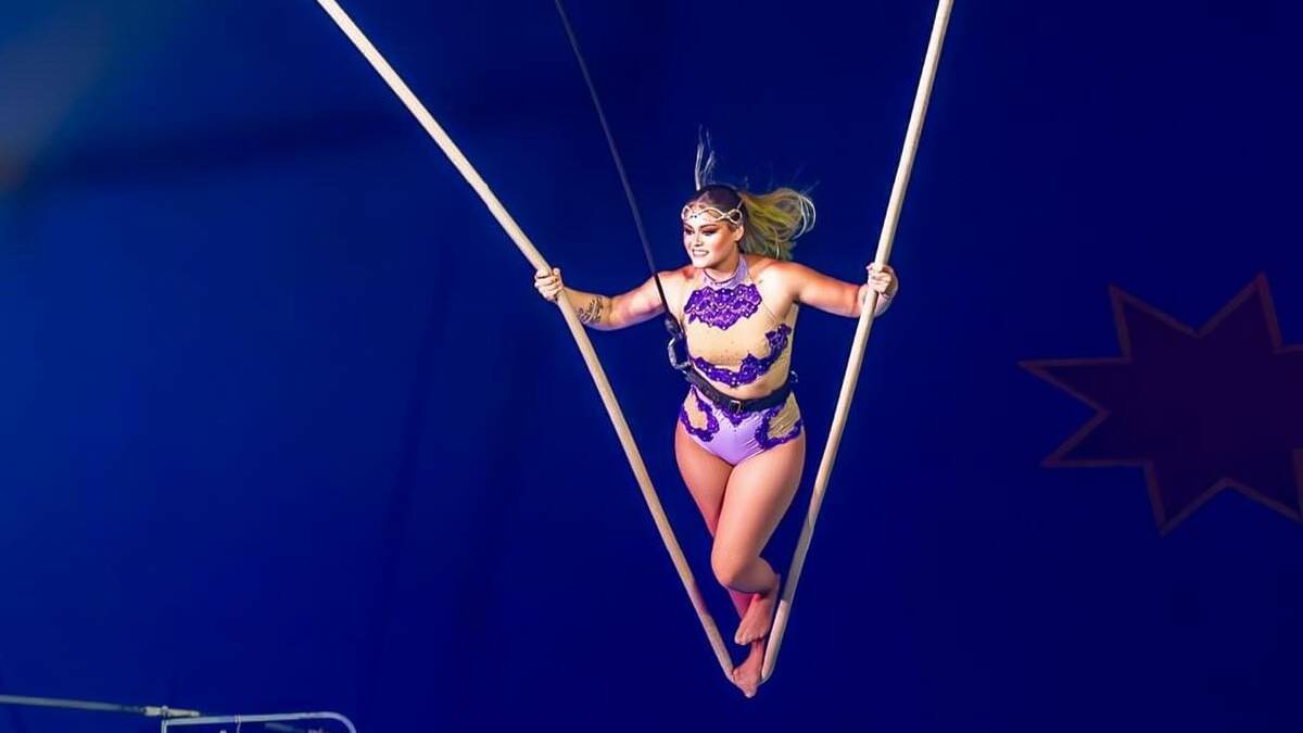 A daring trapeze act. 