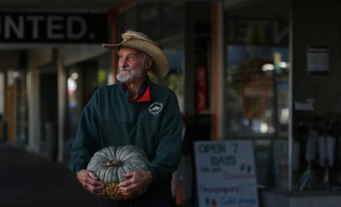 PUMPKIN KING: Oakhampton farmer Austin Breiner with one of his pumpkins at the Slow Food Earth Market in The Levee. Picture: Simone De Peak