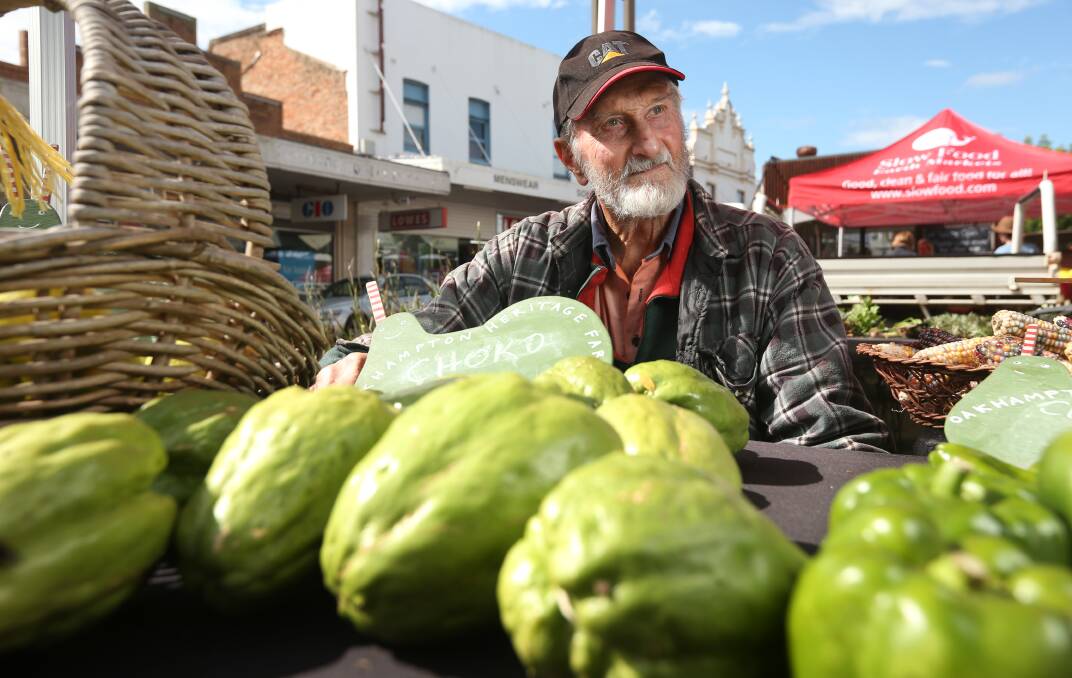 GOURD IDEA: Farmer Austin Breiner with some of his choko crop at the Slow Food Earth Market Maitland. Picture: Simone De Peak 