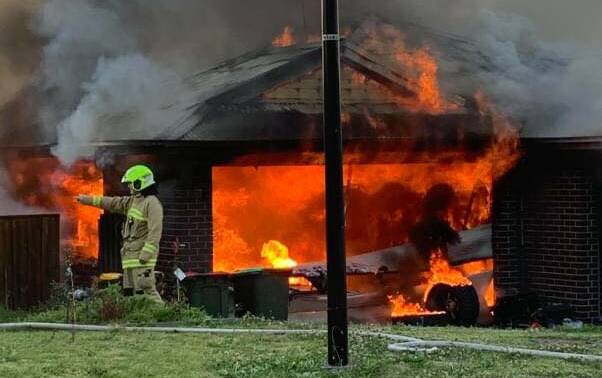 FIRE: Firefighters put out the blaze on Holland Crescent on Tuesday. Picture: NSW Fire and Rescue