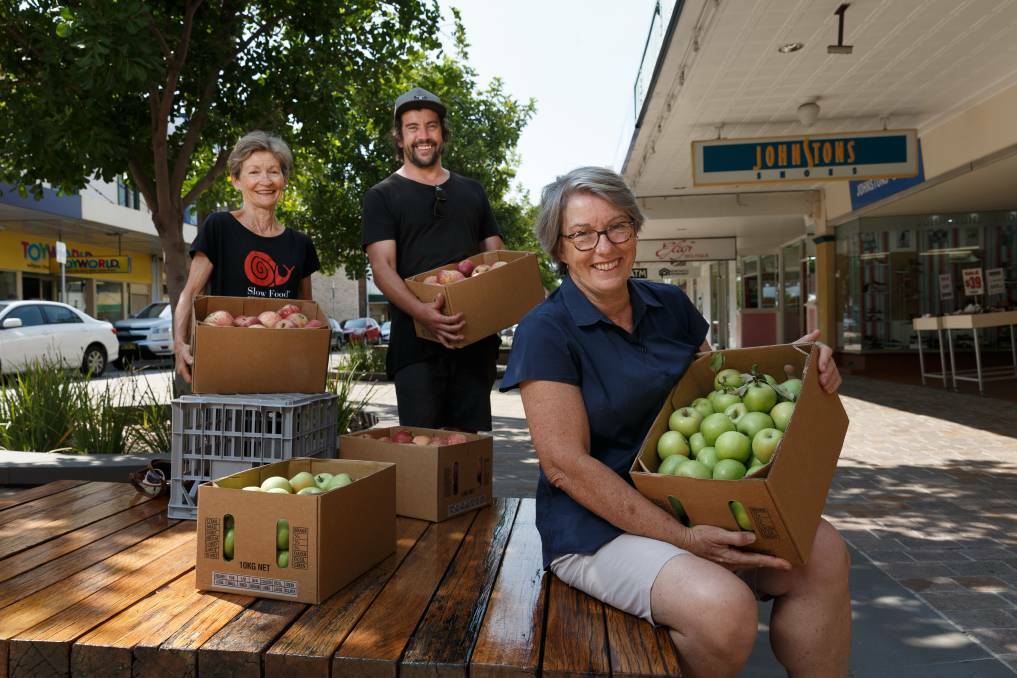 PICKING: Slow Food Hunter Valley leader Anne Kelly (far right) will pick pumpkins with volunteers on Friday for farming families in Coonabarabran. 
