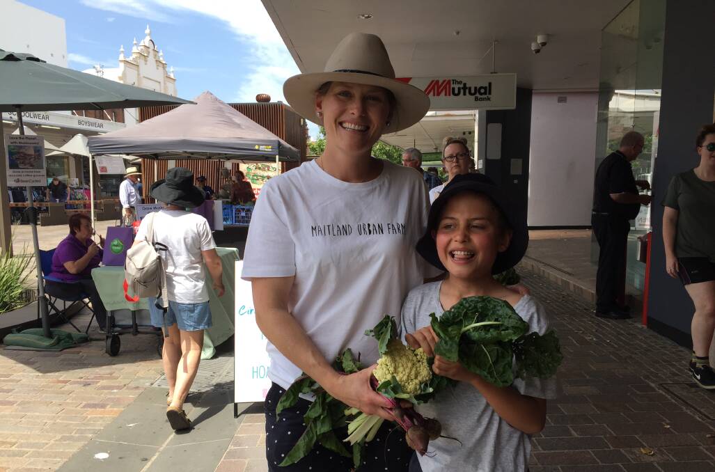NEW BEGINNINGS: Emily Baitch and her son Charlie at their first Slow Food Earth Market Maitland in The Levee.