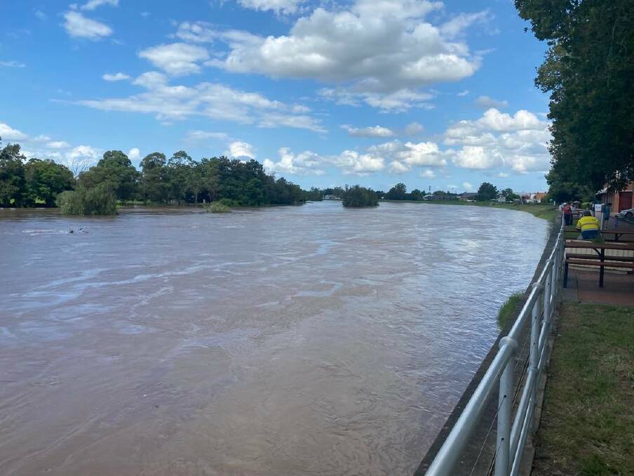 CLOSE CALL: The Hunter River near the Belmore Bridge at Maitland on Friday afternoon. Picture: Michael Hartshorn
