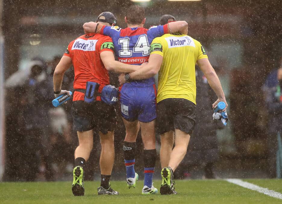 GONE: Connor Watson leaves the field with a suspected ruptured Achilles tendon. Picture: Getty Images