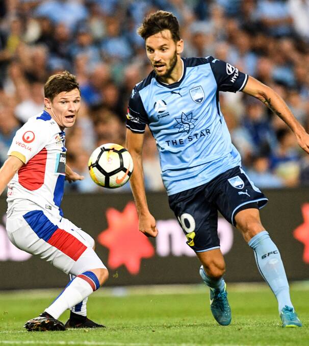BRILLIANT: Milos Ninkovic scored a contender for goal of the season to open Sydney's account. 