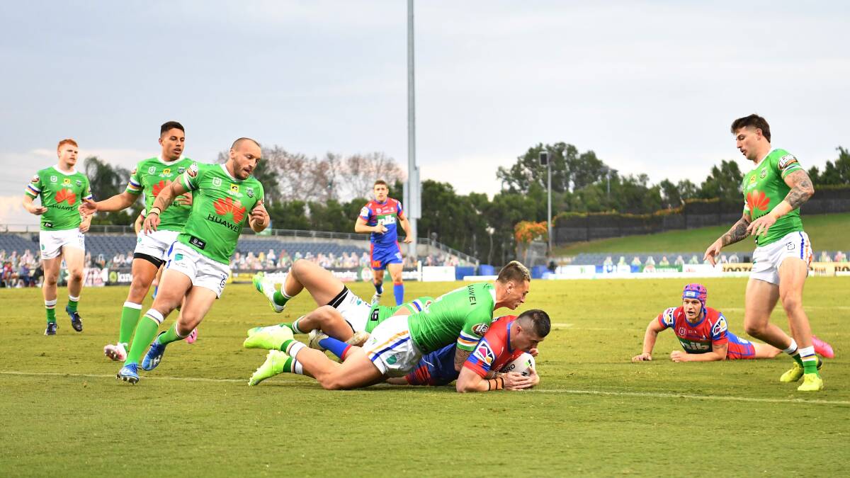 TRY TIME: Bradman Best crashes over to help send the Knights on the way to a 34-18 win over the Raiders.