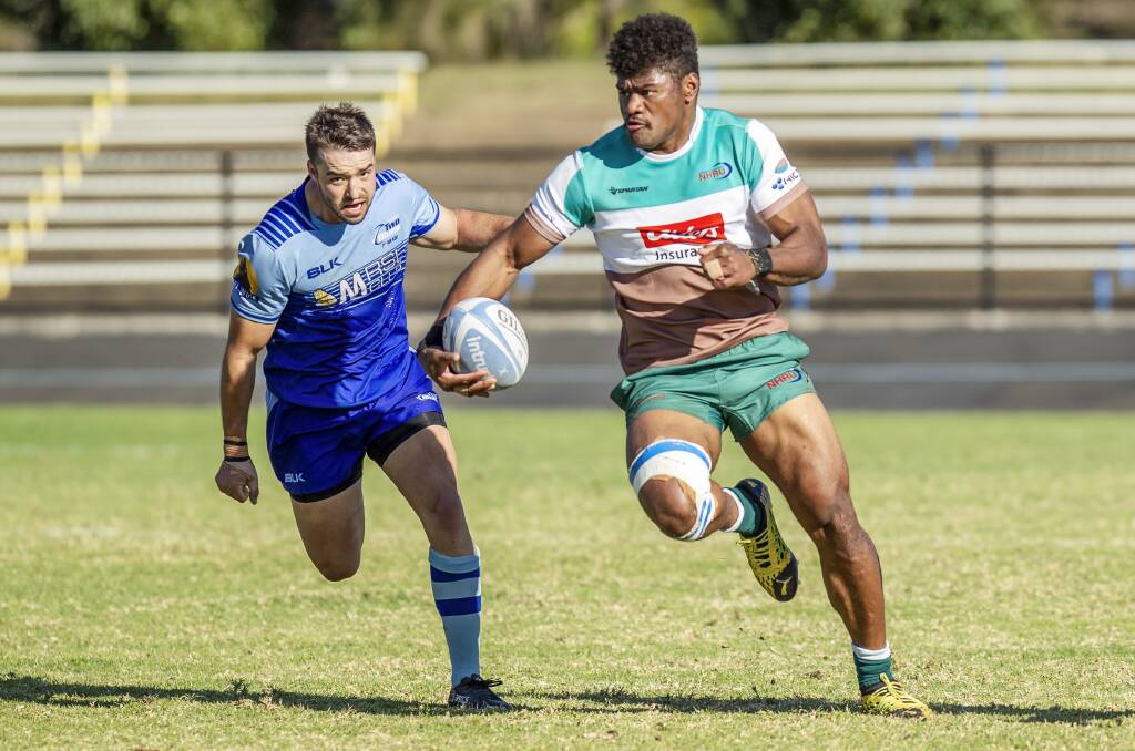 ON THE FLY: Powerhouse Hunter Wildfires winger Nimi Qio burst clear of a Western Sydney defender. Picture: Stewart Hazell