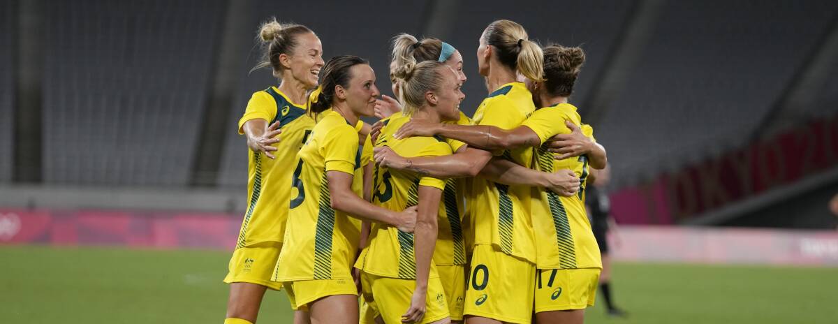GOLDEN START: The Matildas celebrate a goal in their 2-1 win over New Zealand. Picture: AAP