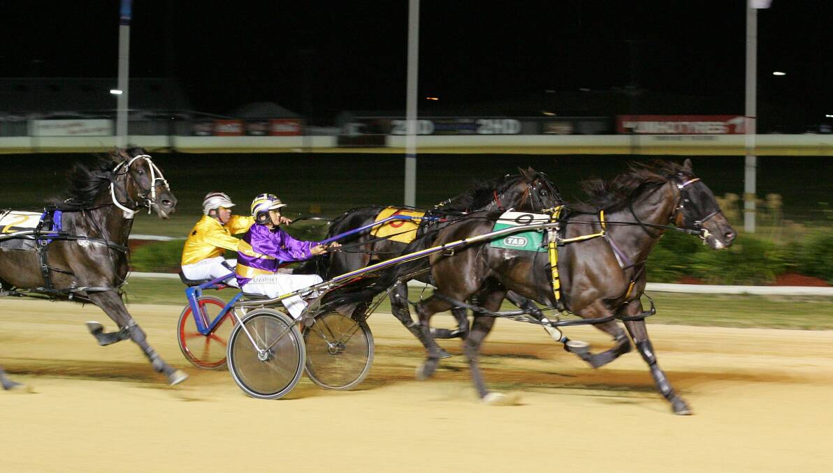 LEGEND: The great Blacks A Fake winning an Inter Dominion qualifier at Newcastle Paceway in 2010. Picture: Dean Osland
