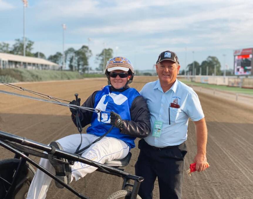 FAMILY AFFAIR: Driver Brad Elder and his uncle, Michael Elder, after Bright Energy's win on Saturday night. Michael owns and bred the five-year-old gelding. Picture: Club Menangle