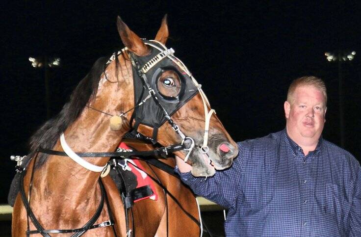 SIDELINED: Newcastle horse of the year Takara Truffle and trainer Aaron Goadsby.