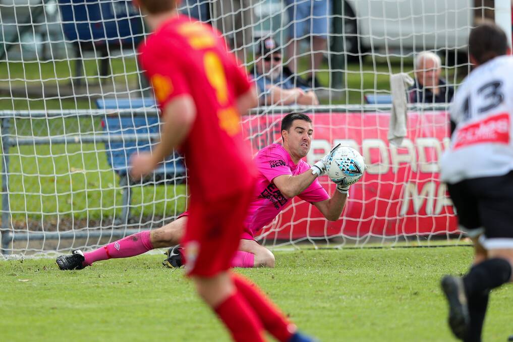 Matt Trott makes a save for Maitland against Broadmeadow in a semi-final in 2020. Picture by Max Mason-Hubers