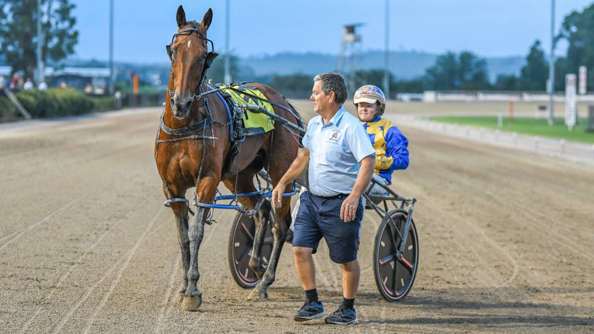 IN: Owner-breeder Michael Elder with Bright Energy and nephew Brad Elder after a win at Menangle. 