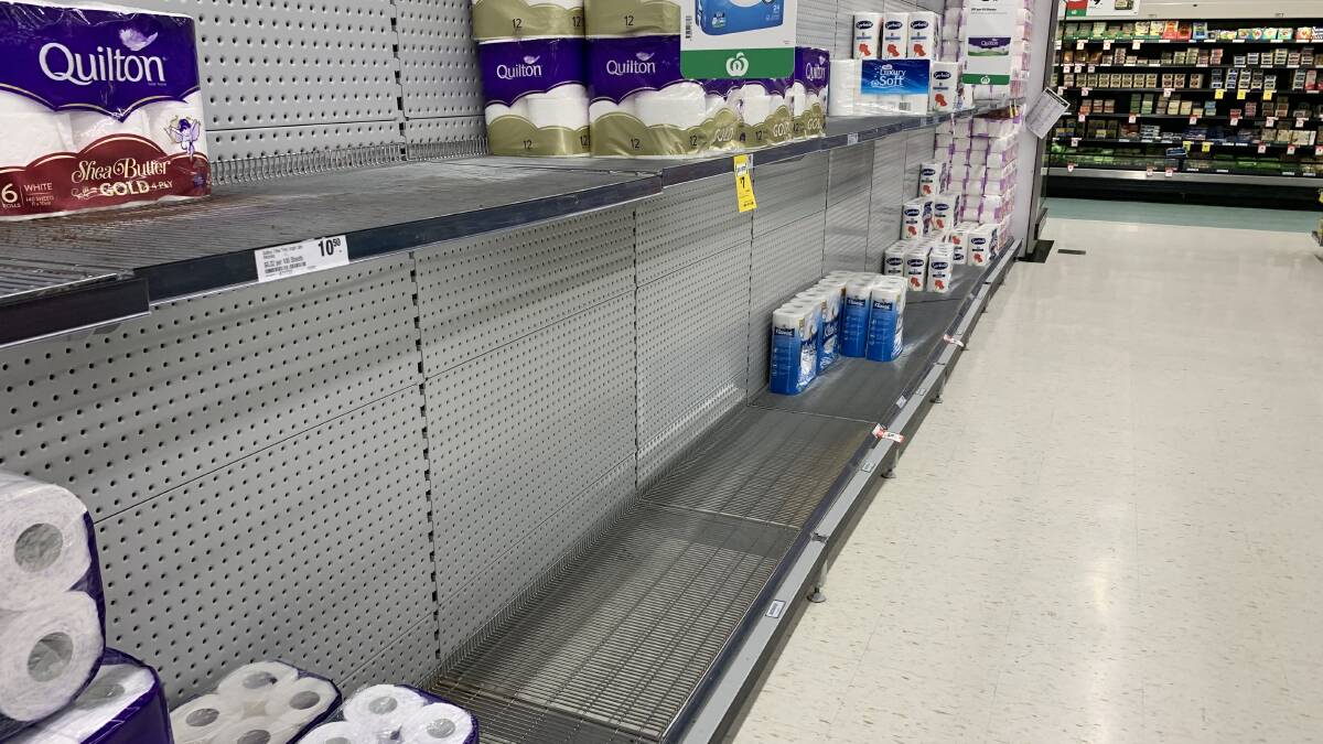 CRAZY: These are the Beaudesert Woolworths shelves this Saturday morning as shoppers start to panic buy should a second wave of COVID-19 hit Queensland.
