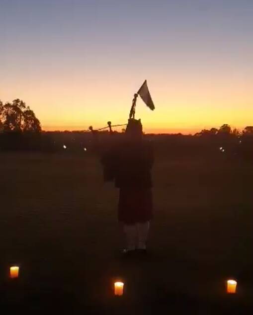 A bagpiper welcomed the dawn at Rutherford.