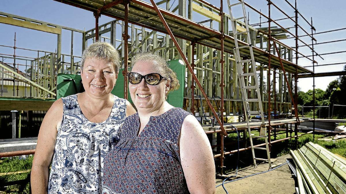 Kay and Stacy Hipwell inspect the progress of their new homes at Lochinvar. Pic: Perry Duffin