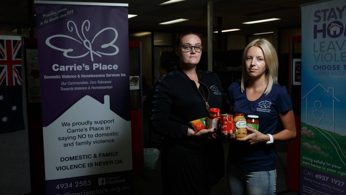 DRIVE: Carrie's Place case workers Fiona Richards and Sam Allen. The service is in need of food to help victims who have fled domestic violence. Picture: Max Mason-Hubers