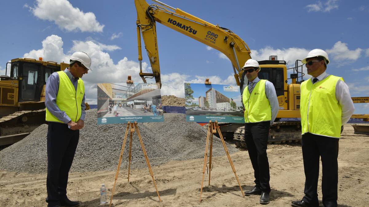 Underway: Scot MacDonald (left) unveils the new Maitland Hospital site last week with  project director Gavin Thompson and New England health executive leader Eddie Pirillo. Picture: Lachlan Leeming