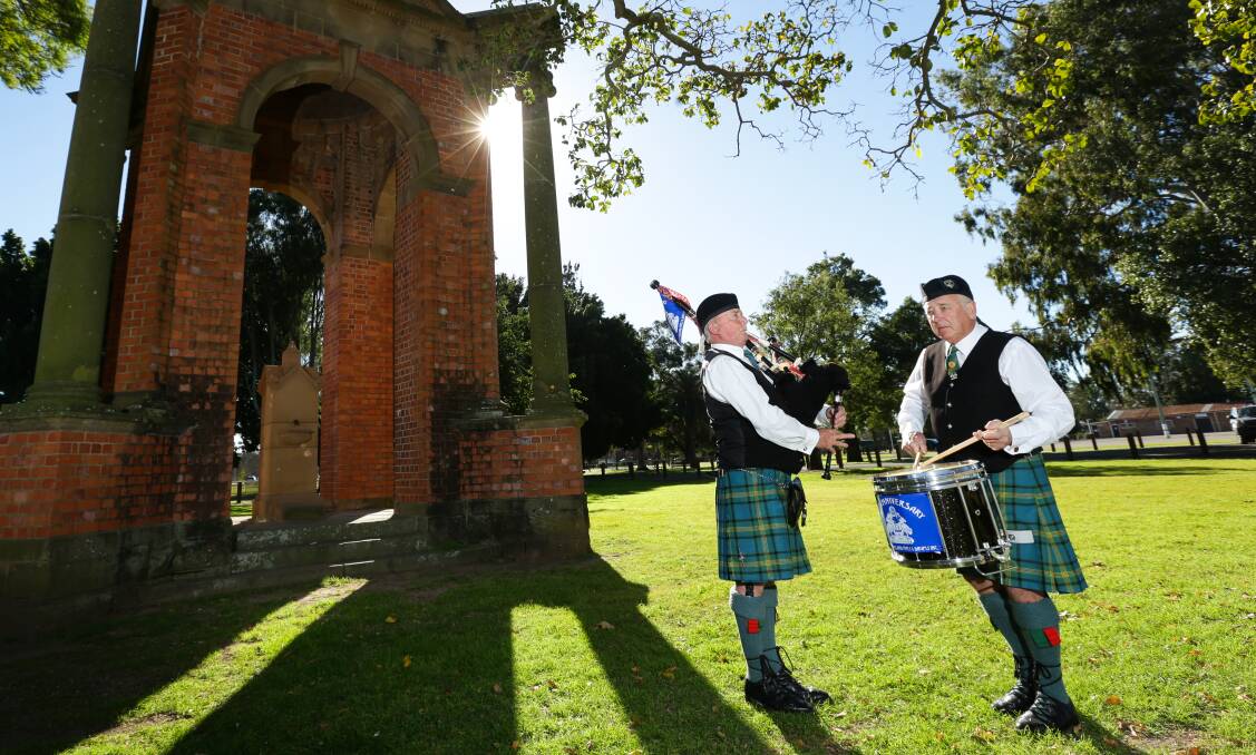 HISTORY: City of Maitland Pipes and Drums members Greg Dewar and Ian Innes. The band will perform a special rendition of The Battles O’er this Sunday to honour the centenary of Armistice. Picture: Jonathan Carroll