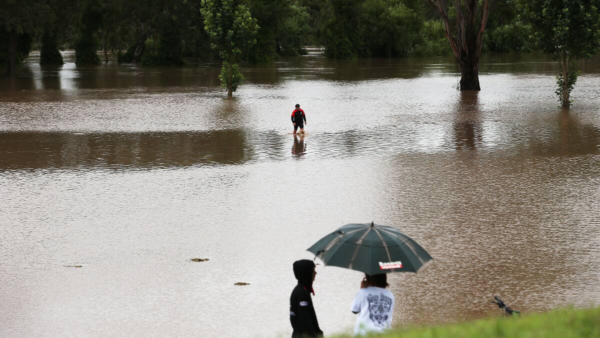 WET: The Hunter River burst its banks after intense rainfall late last month. Picture: Peter Lorimer