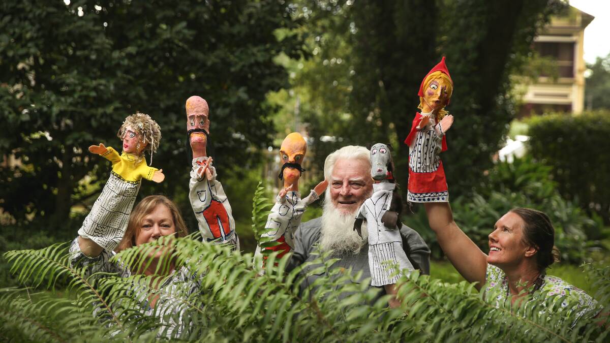 FUN: Amanda Venz, Frank Oakes and Helen Hopcroft with Frank's Little Red Riding Hood puppets which will be part of this Saturday's event. Picture: Marina Neil