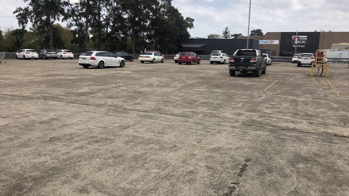 OPEN: The rooftop car park near the former Supercheap Auto on Ken Tubman Drive was mostly empty at midday on Monday.