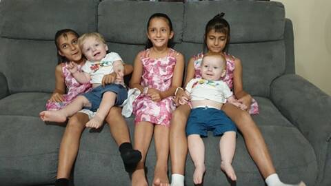 Janet Fenton's triplets Tamara, Maya and Jasmine and twins Vincent and Preston.