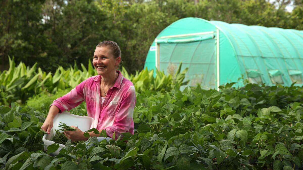 BETTER TIMES: Melissa Fogarty amongst her luscious vegetable patch at Blue Boat Farm Gate in Medowie. Picture: Simone De Peak